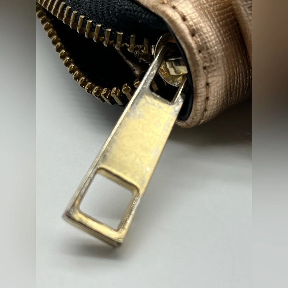Aldo rose gold wallet with top bow